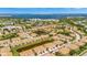Aerial view of a waterfront community with a scenic view of the water and neatly arranged homes at 4062 Overture Cir # 4062, Bradenton, FL 34209