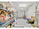 Spacious two car garage with ample storage and bikes create an ideal space for DIY and auto enthusiasts at 4062 Overture Cir # 4062, Bradenton, FL 34209