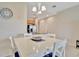 Dining area featuring a kitchen with stainless steel appliances and wood cabinets at 4062 Overture Cir # 4062, Bradenton, FL 34209