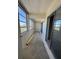 Outdoor balcony featuring windows, providing ample light and cityscape view at 7321 Central Ave # 504, St Petersburg, FL 33710