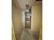 Small utility room with furnace and minimal lighting, ideal for storage or HVAC at 7321 Central Ave # 504, St Petersburg, FL 33710
