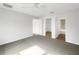 Spacious bedroom with carpet flooring and adjacent bathroom at 11510 Southern Creek Dr, Gibsonton, FL 33534