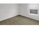 Neutral bedroom with carpet flooring, and a window at 11510 Southern Creek Dr, Gibsonton, FL 33534