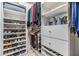 Organized walk-in closet with shelves and drawers, providing ample storage space for shoes, clothes, and accessories at 12387 Eastpointe Dr, Dade City, FL 33525