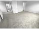 Bedroom with neutral carpet and freshly painted walls at 1857 Clearbrooke Dr, Clearwater, FL 33760