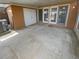 Outdoor patio area provides additional storage with double doors, plus HVAC unit at 1857 Clearbrooke Dr, Clearwater, FL 33760