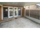 Covered patio with a privacy fence, creating an inviting outdoor space at 1857 Clearbrooke Dr, Clearwater, FL 33760