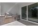 Well-equipped outdoor kitchen featuring a grill, counter space, and a convenient sink at 2551 Alhaven Ter, North Port, FL 34286
