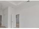 Image showcasing an open area with visible doorframes and neutral walls and floors at 2551 Alhaven Ter, North Port, FL 34286