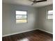 Bedroom featuring hardwood floors, and natural light at 702 Desert Hills Way, Sun City Center, FL 33573