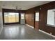 Sunroom featuring a ceiling fan, tile floors and plenty of natural light at 702 Desert Hills Way, Sun City Center, FL 33573