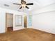 Bright bedroom featuring a ceiling fan, carpet flooring, and a closet at 1481 Newton St, Port Charlotte, FL 33952