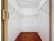 Walk-in closet featuring ample metal shelving and carpeted flooring at 1481 Newton St, Port Charlotte, FL 33952