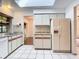A view of the kitchen featuring white appliances, generous counter space, and a bright, airy feel at 1481 Newton St, Port Charlotte, FL 33952