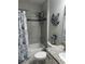 Cozy bathroom with a shower-tub combination and granite counters at 2137 Apian Way, Port Charlotte, FL 33953