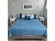 Airy bedroom featuring light-colored walls and nautical themed decor at 2137 Apian Way, Port Charlotte, FL 33953