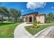 Beautiful stone and stucco building exterior with archway at 2137 Apian Way, Port Charlotte, FL 33953