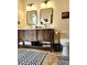 Elegant bathroom with a dual sink wooden vanity, modern mirrors, and a toilet at 2806 W Shelton Ave, Tampa, FL 33611