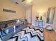 Charming bedroom with stylish decor, a sign that reads 