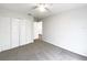 Neutral bedroom offers carpeted flooring and closet space at 2007 Rain Dance Pl, Brandon, FL 33510