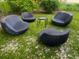 Backyard features outdoor seating area; great for entertaining and enjoying the greenery at 681 Dalton Blvd, Port Charlotte, FL 33952