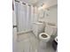 Bathroom with shower/tub combo and white vanity at 681 Dalton Blvd, Port Charlotte, FL 33952