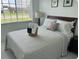 Bedroom with a queen size bed and natural light at 681 Dalton Blvd, Port Charlotte, FL 33952