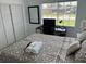Bright bedroom with a workspace and window at 681 Dalton Blvd, Port Charlotte, FL 33952