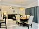 Open concept living space showcasing the dining and living room at 681 Dalton Blvd, Port Charlotte, FL 33952