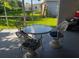Covered patio with a seating area and view of the backyard at 681 Dalton Blvd, Port Charlotte, FL 33952