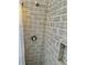 Shower with tile surround and shower niche at 681 Dalton Blvd, Port Charlotte, FL 33952