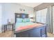 Comfortable bedroom with a cozy bed, soft lighting, and charming starfish decor at 10764 70Th Ave # 3305, Seminole, FL 33772