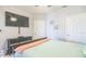 Neutral bedroom with a TV, ceiling fan, and ample natural light from the windows at 10764 70Th Ave # 3305, Seminole, FL 33772