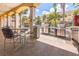 Community grill area with seating, featuring multiple stainless steel grills, perfect for outdoor cooking at 10764 70Th Ave # 3305, Seminole, FL 33772