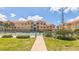 Well-maintained community tennis court offers a great space for exercise surrounded by attractive condo buildings at 10764 70Th Ave # 3305, Seminole, FL 33772