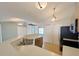 Kitchen showcasing stainless steel appliances, long countertops, and an open layout for easy entertaining at 12092 Rockford St, Spring Hill, FL 34608