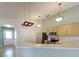 Kitchen with stainless steel appliances, wood cabinets, and a breakfast bar perfect for entertaining at 12092 Rockford St, Spring Hill, FL 34608