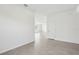 A bright, spacious living room features tile floors and an open concept layout at 1878 Draughton Dr, Zephyrhills, FL 33541