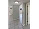 Hallway features tile floors at 3213 Bigelow Dr, Holiday, FL 34691