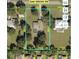 Aerial view of the property showcasing lot lines, pool, and surrounding greenery at 3652 Oak Grove Dr, Sarasota, FL 34243