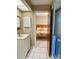 Clean bathroom showcasing vanity and shower stall plus access to bedroom at 3652 Oak Grove Dr, Sarasota, FL 34243