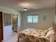 Comfortable bedroom with tiled flooring and a ceiling fan at 3652 Oak Grove Dr, Sarasota, FL 34243