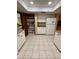 Spacious kitchen with ample storage, white appliances, and a convenient layout at 3652 Oak Grove Dr, Sarasota, FL 34243