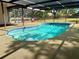 A serene screened-in pool with ample deck space offers a relaxing outdoor retreat at 3652 Oak Grove Dr, Sarasota, FL 34243