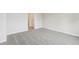 Empty bedroom with neutral carpet and an ensuite bathroom at 2320 E Newsome Rd, Plant City, FL 33565