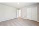 Spacious carpeted bedroom with neutral walls and closet, offering comfort and storage at 3904 Radiant Mountain Dr, Plant City, FL 33565