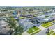 Wide aerial view of a waterfront community with canal access and well-maintained homes at 8704 Bay Crest Ln, Tampa, FL 33615