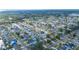 Large-scale aerial view of a residential waterfront community with canals and boat docks at 8704 Bay Crest Ln, Tampa, FL 33615