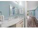 Updated bathroom with marble countertop and modern fixtures at 8704 Bay Crest Ln, Tampa, FL 33615