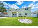 Charming two-story home with a well-manicured lawn and inviting front entrance at 8704 Bay Crest Ln, Tampa, FL 33615